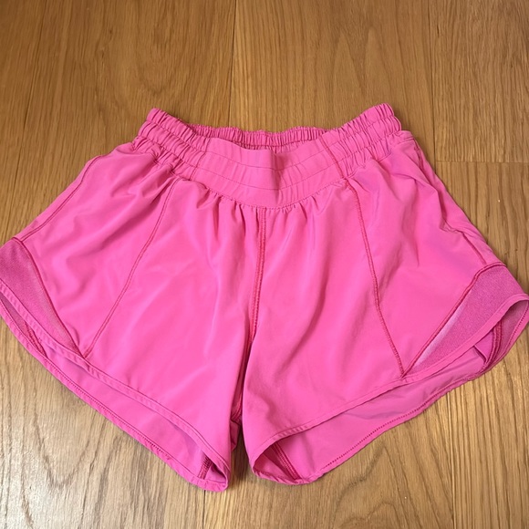 lululemon athletica Pants - Sonic pink lululemon Hotty hots 4” size 4. Good condition.